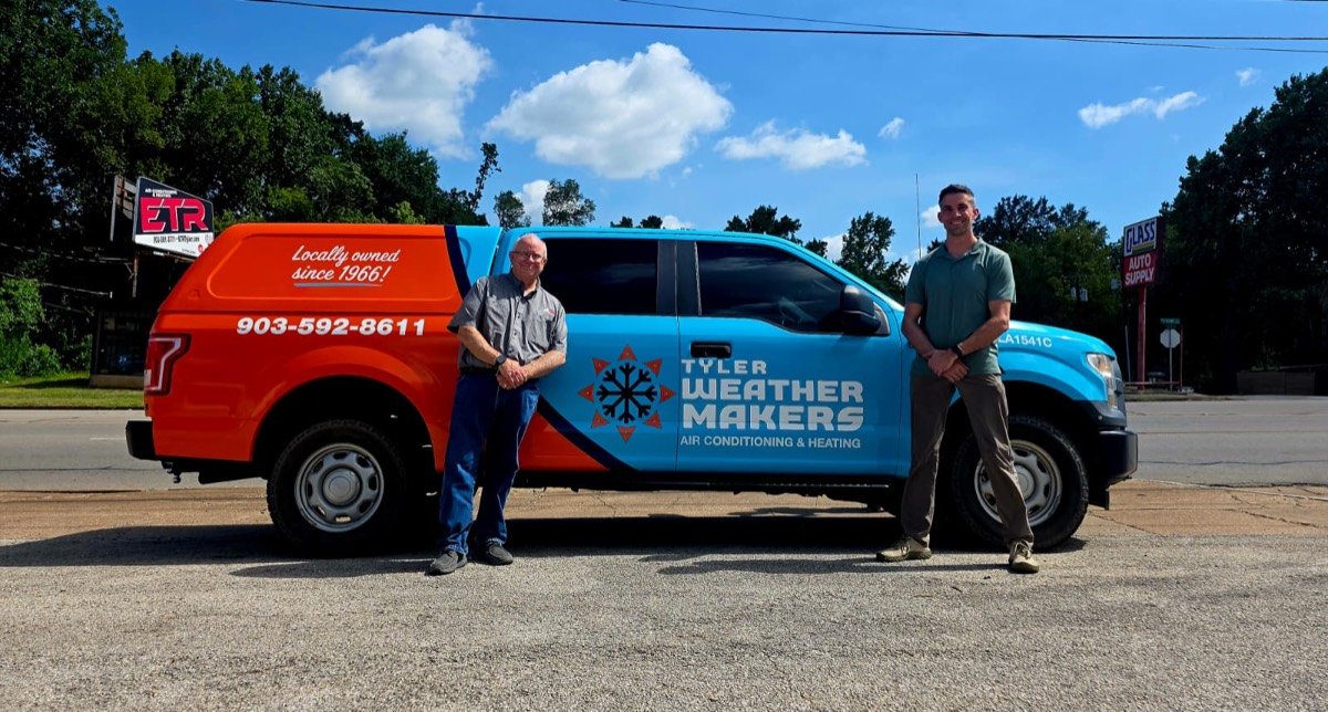Local business client with completed vehicle wrap